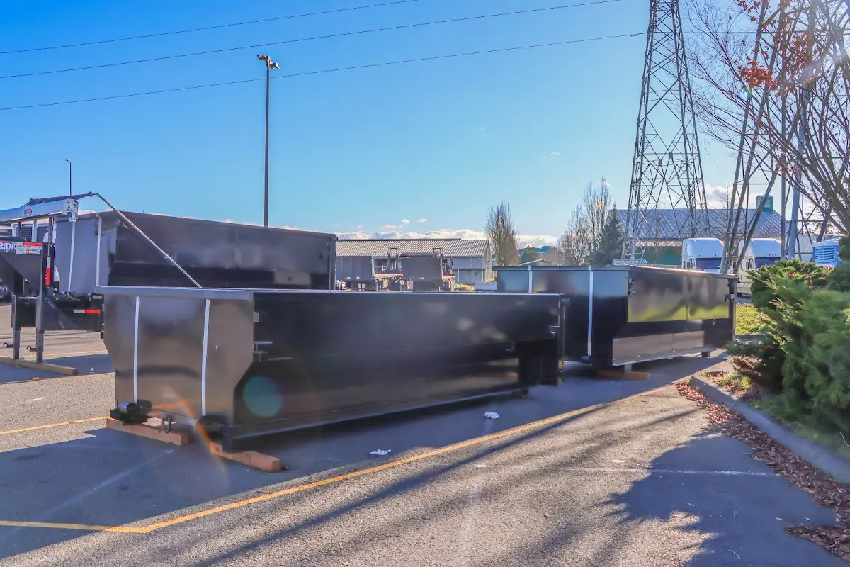 Roll-off dumpster ready for waste disposal at job site for 3 Yard Dumpster Rental in DeLand